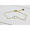 BRACELET PERLES ET OEIL BLANCS ACIER INOXYDABLE GOLD PETIT PRIX
