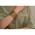 JONC BOUDDHISTE TIBETAINS KUMLAI LIGHT GOLD PAS CHER