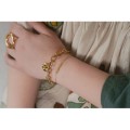 BRACELET CINQ FLEURS ACIER INOXYDABLE GOLD PETIT PRIX
