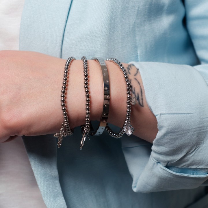 BRACELET ELASTIQUE PERLES MEDAILLON OVALE ACIER INOX SILVER PETIT PRIX
